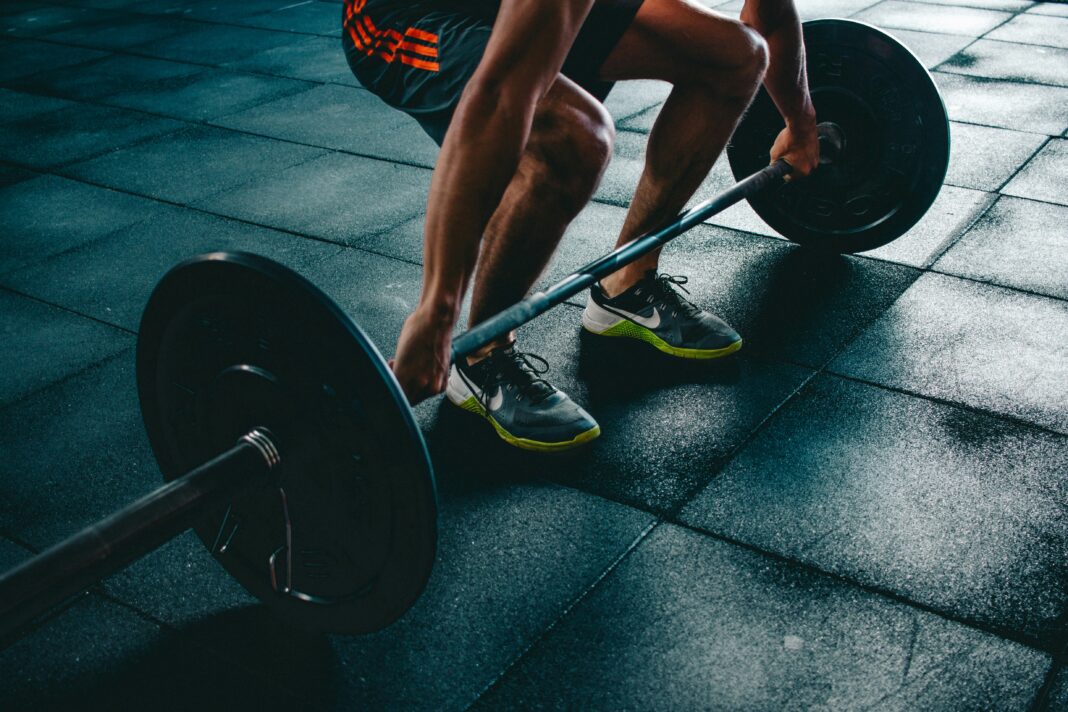 Runner performing minimalist strength exercises to improve stride and prevent injuries.