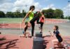 Strength Training for Runners: Coach T’s Complete Guide to Building Power, Efficiency, and Injury-Free Speed Runner doing plyo box step-ups for strength training outdoors.