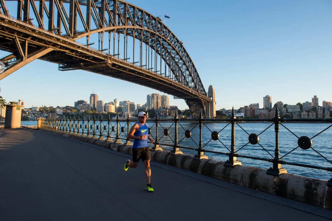 Runners will be crossing the Sydney Harbour Bridge during the 2025 TCS Sydney Marathon, with the Opera House in the background.