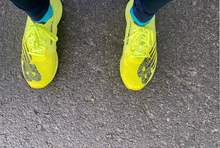 marathon-race-shoes-selection Multiple marathon racing running shoes laid out