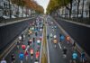 Break 4:00, 3:30, 3:00: Your Smart Marathon Blueprint marathon runners pushing toward the finish line during a major race