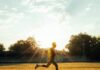 Is an Online Running Coach Worth It? An Honest Answer Runner sprinting on a track at golden hour